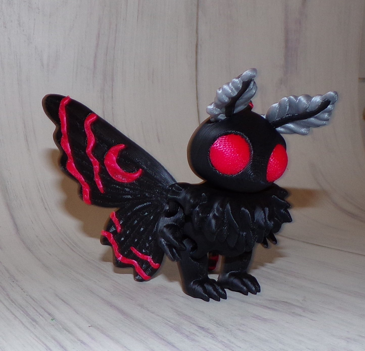 Moth Man 3D Printed Articulated Figurine - Wonderland 3D Printing