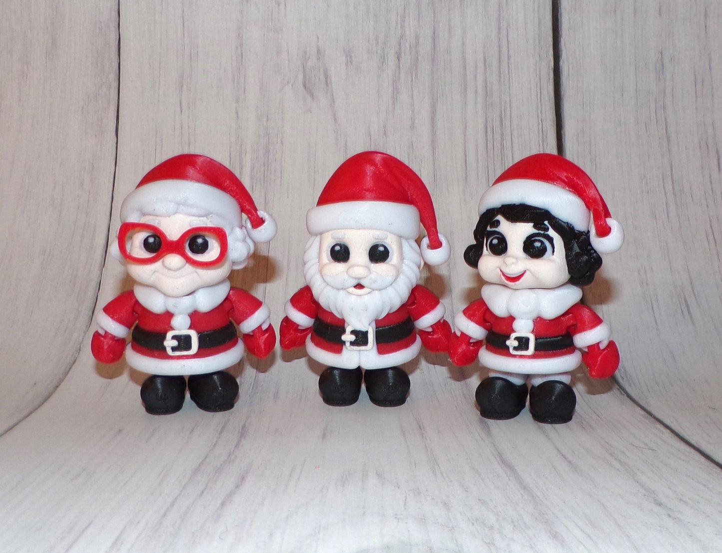Mrs. Clause, Young Mrs. Clause and Santa 3D Printed Articulated Figurine - Wonderland 3D Printing