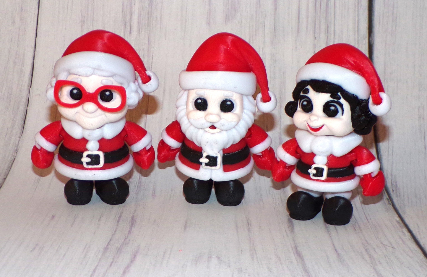 Mrs. Clause, Young Mrs. Clause and Santa 3D Printed Articulated Figurine - Wonderland 3D Printing