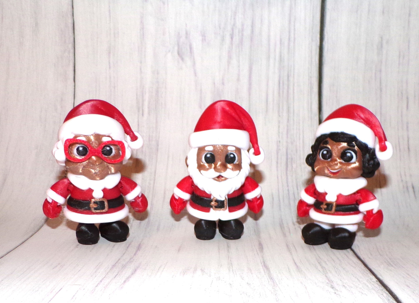 Mrs. Clause, Young Mrs. Clause and Santa 3D Printed Articulated Figurine - Wonderland 3D Printing
