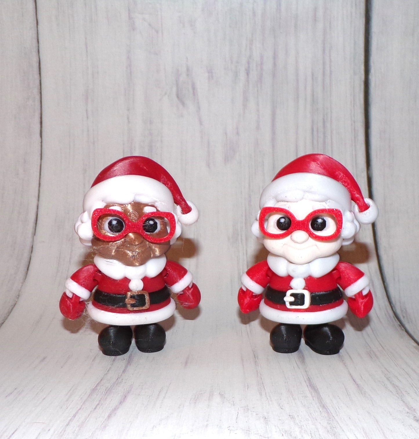 Mrs. Clause, Young Mrs. Clause and Santa 3D Printed Articulated Figurine - Wonderland 3D Printing