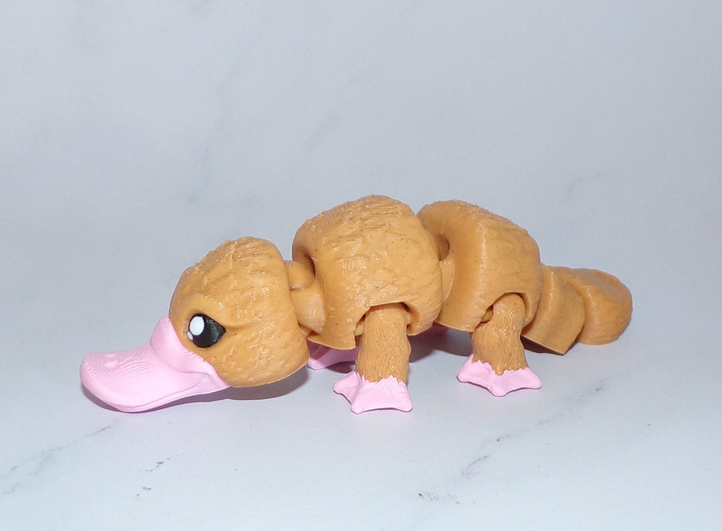 Baby Platypus: 3D Printed Articulated Figurine - Wonderland 3D Printing