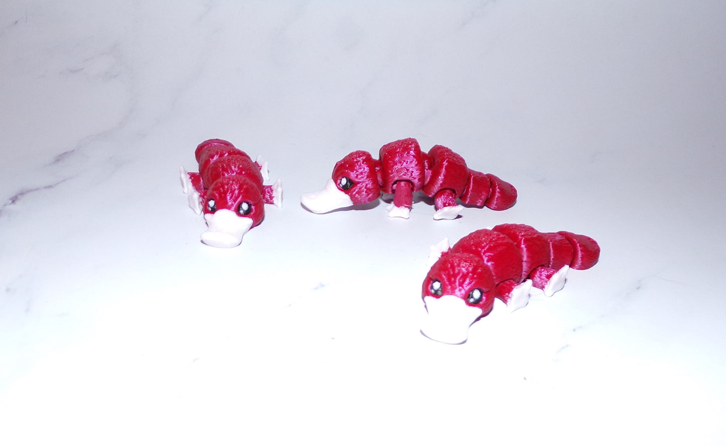 Baby Platypus: 3D Printed Articulated Figurine - Wonderland 3D Printing