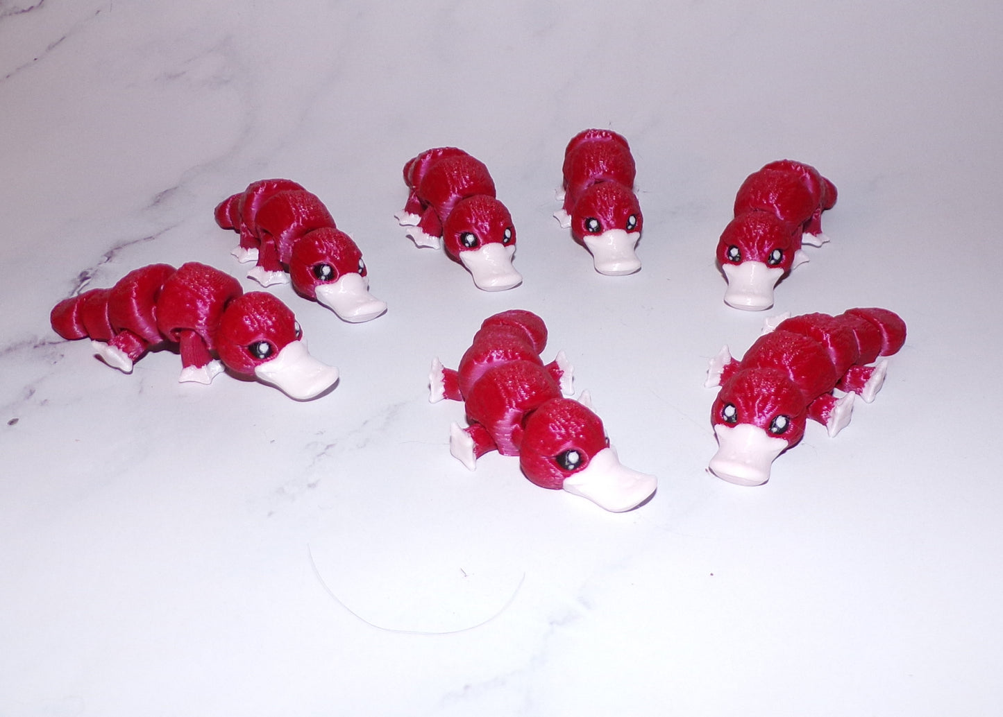 Baby Platypus: 3D Printed Articulated Figurine - Wonderland 3D Printing