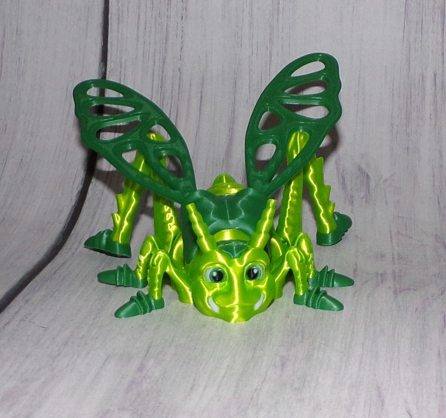 Jimmy the Grasshopper Articulated 3d Printed Figurine - Wonderland 3D Printing