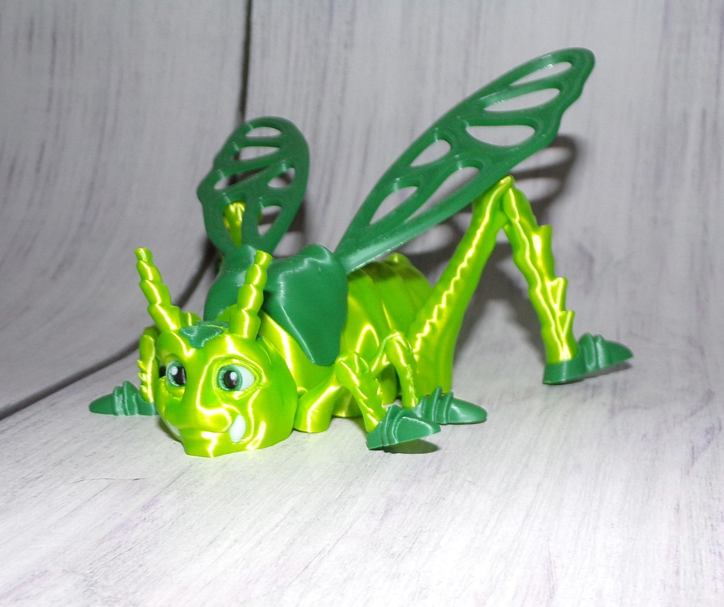 Jimmy the Grasshopper Articulated 3d Printed Figurine - Wonderland 3D Printing