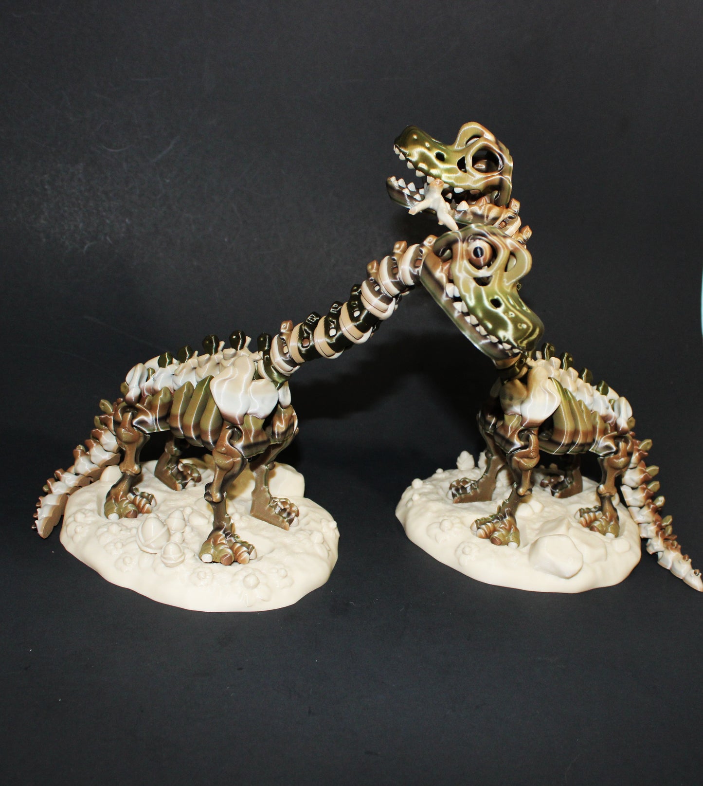 A 3D-printed articulated Brachiosaurs skeleton includes a stand and branch. 7.5" Tall
