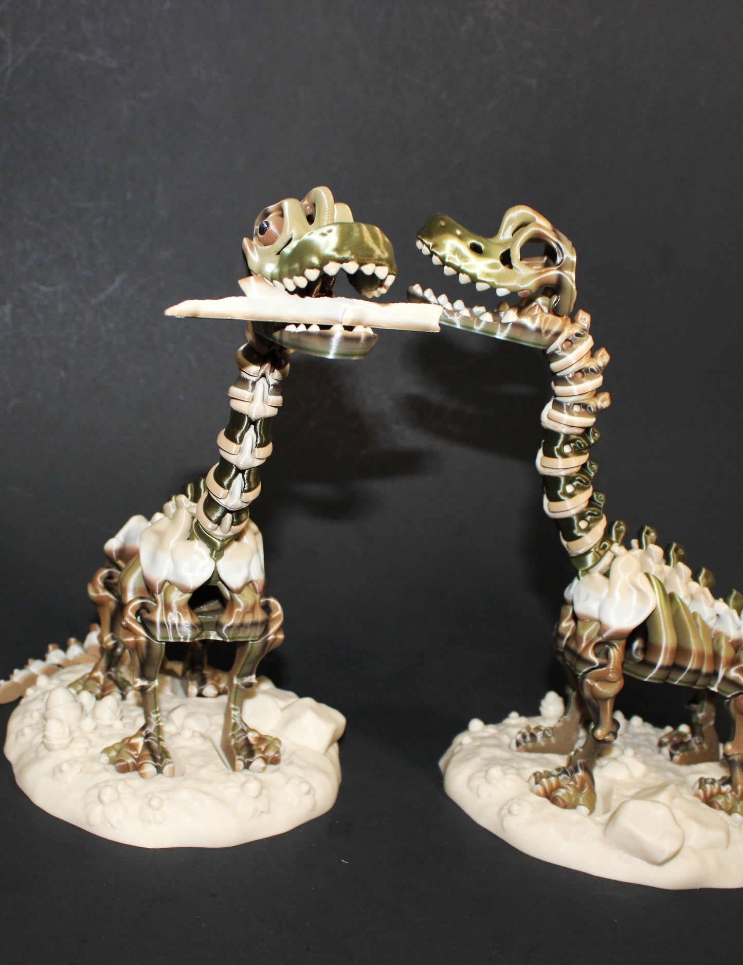 A 3D-printed articulated Brachiosaurs skeleton includes a stand and branch. 7.5" Tall