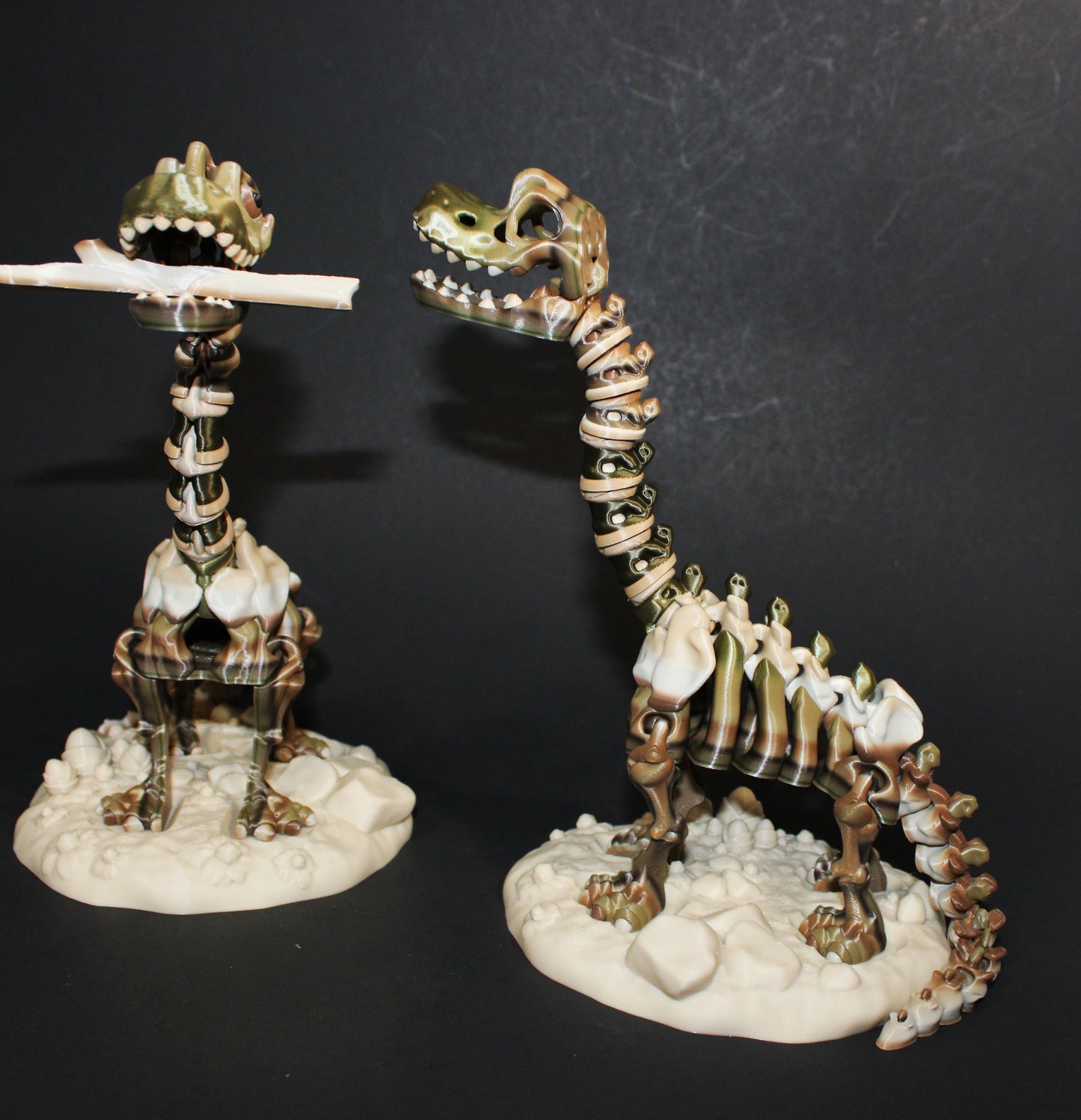 A 3D-printed articulated Brachiosaurs skeleton includes a stand and branch. 7.5" Tall