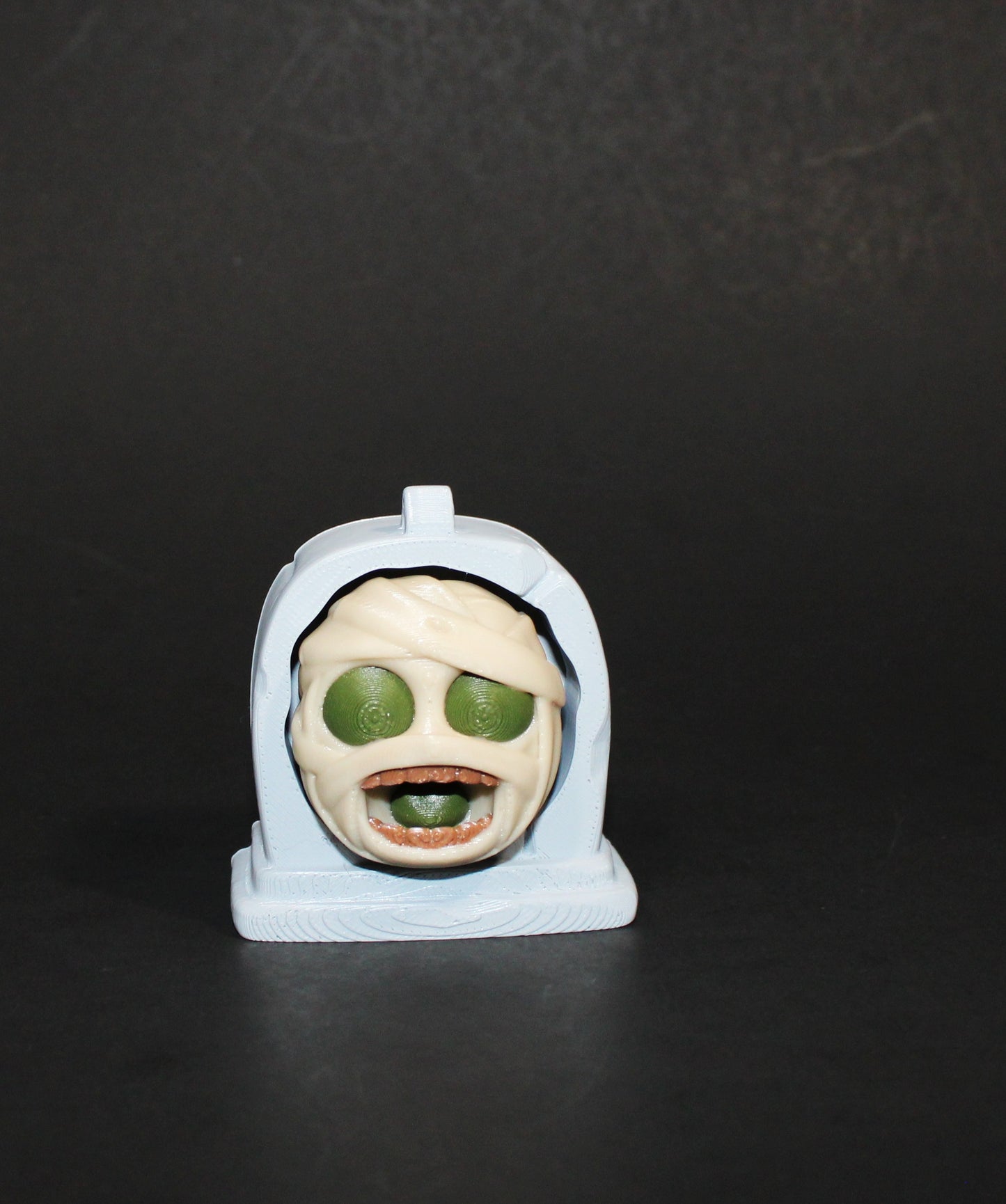3D-printed Halloween keychain clickers, 2 inches.
