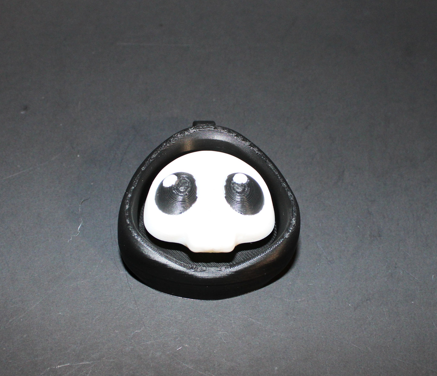 3D-printed Halloween keychain clickers, 2 inches.
