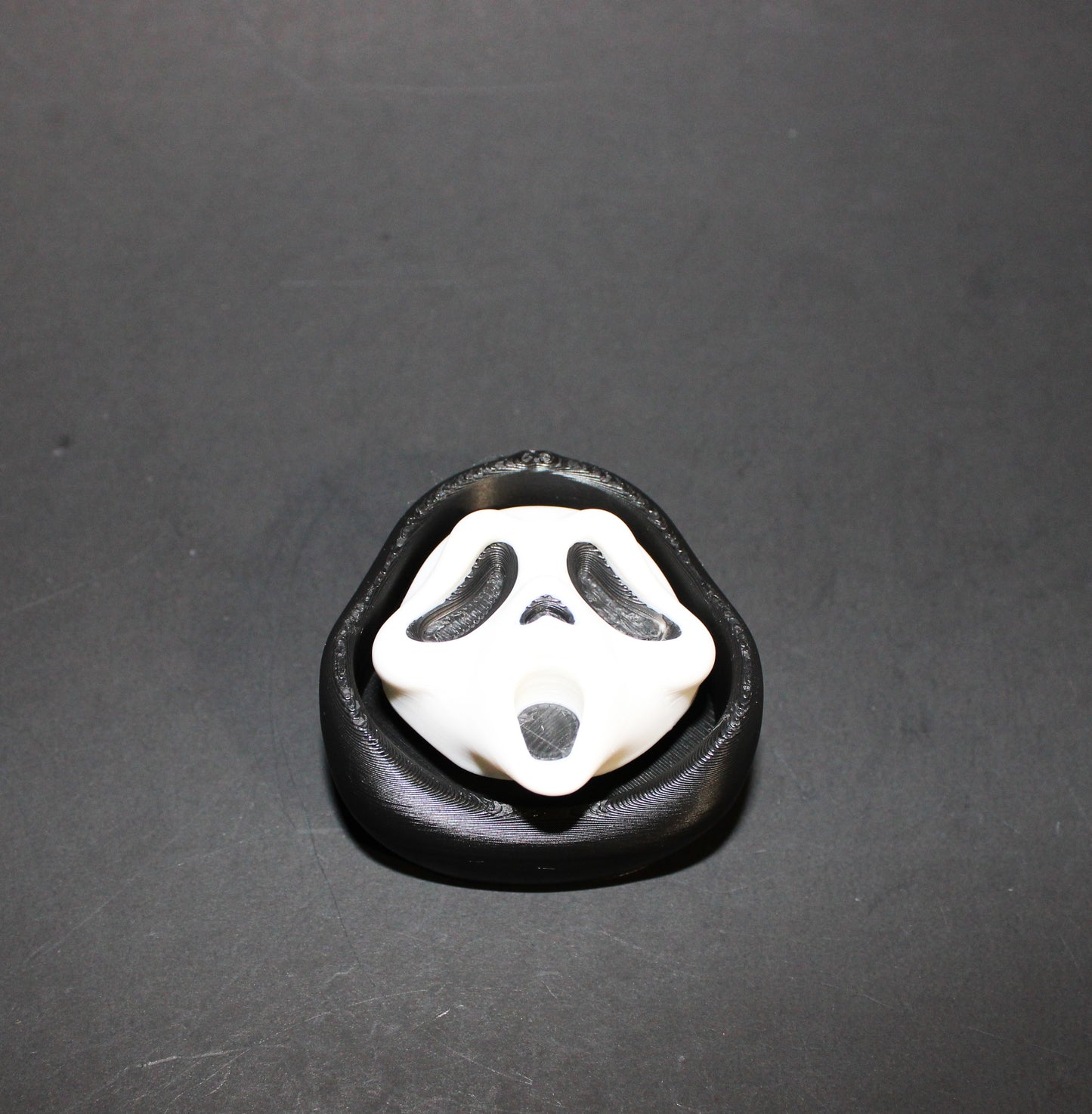 3D-printed Halloween keychain clickers, 2 inches.