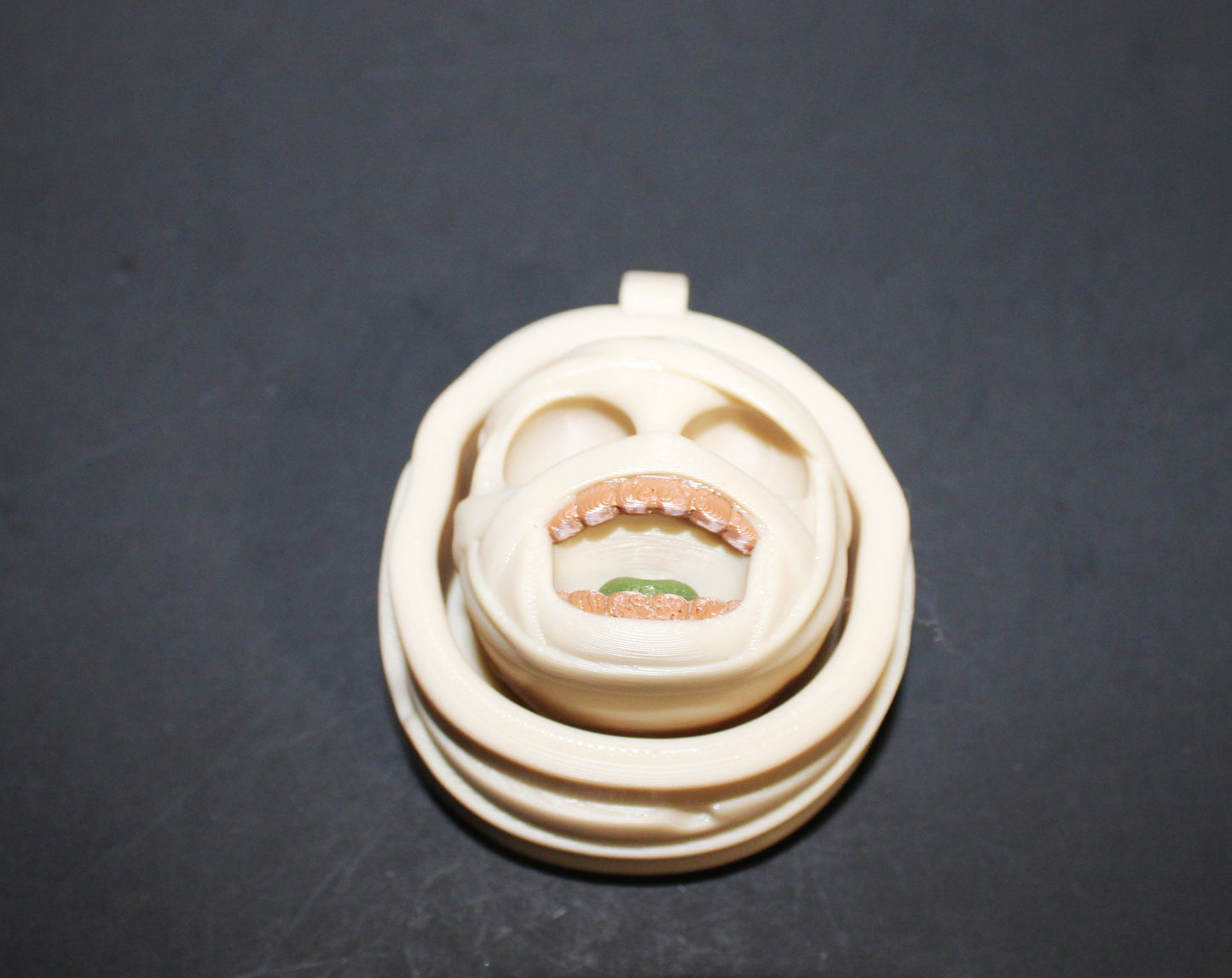 3D-printed Halloween keychain clickers, 2 inches.