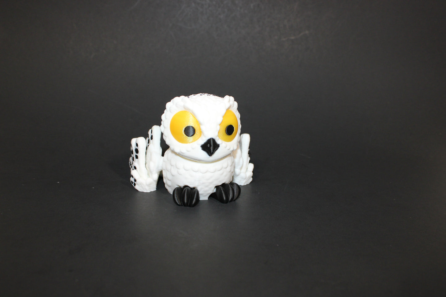 3D-printed flexible owls available in a variety of styles and sizes to suit your preferences.