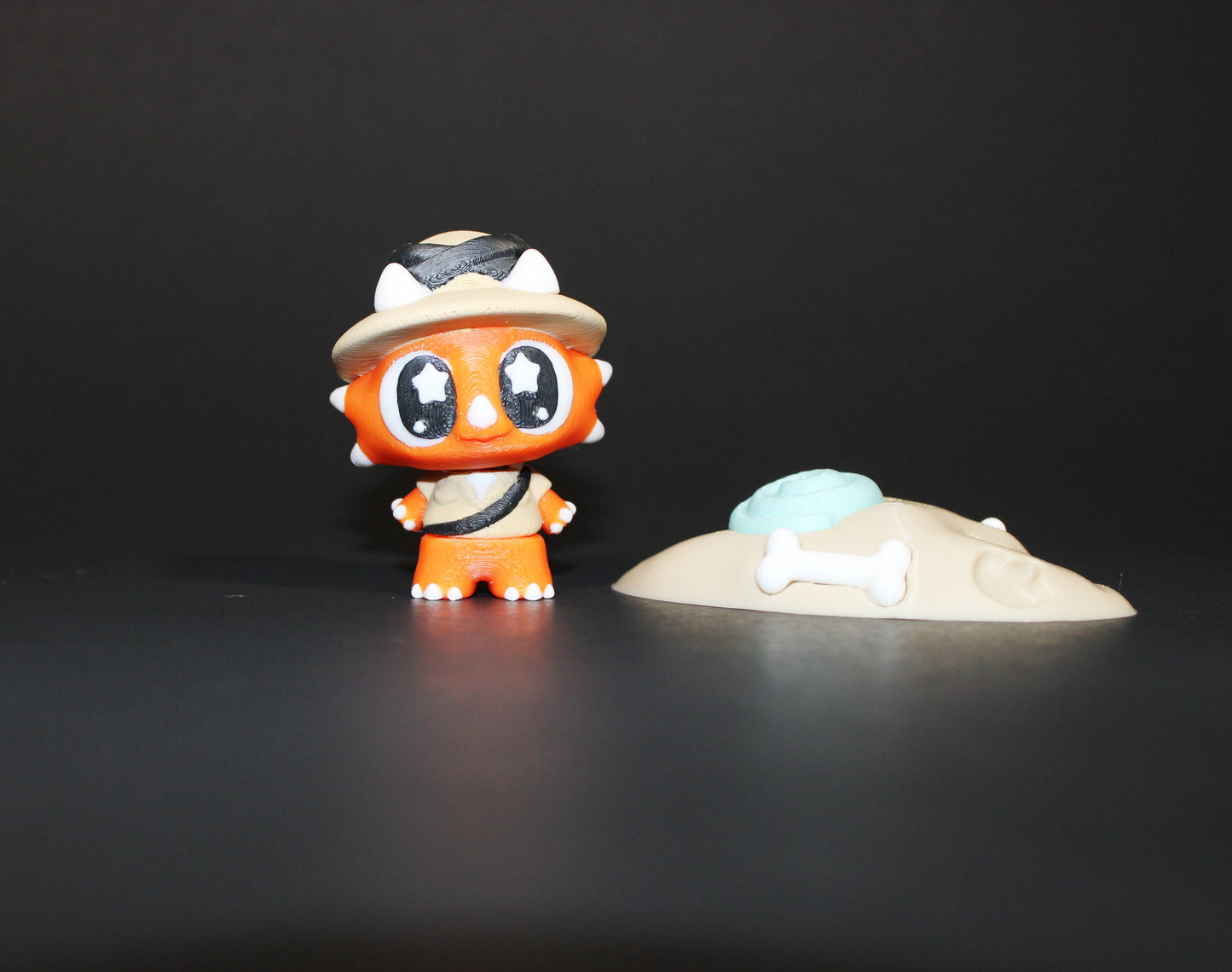 3D Printed Flexi Triceratops Archeologist with fossil