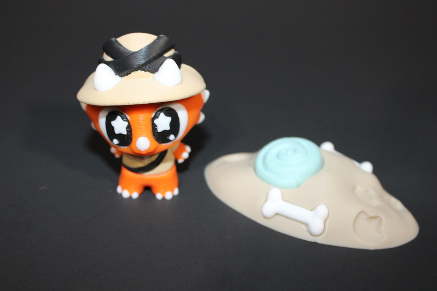 3D Printed Flexi Triceratops Archeologist with fossil