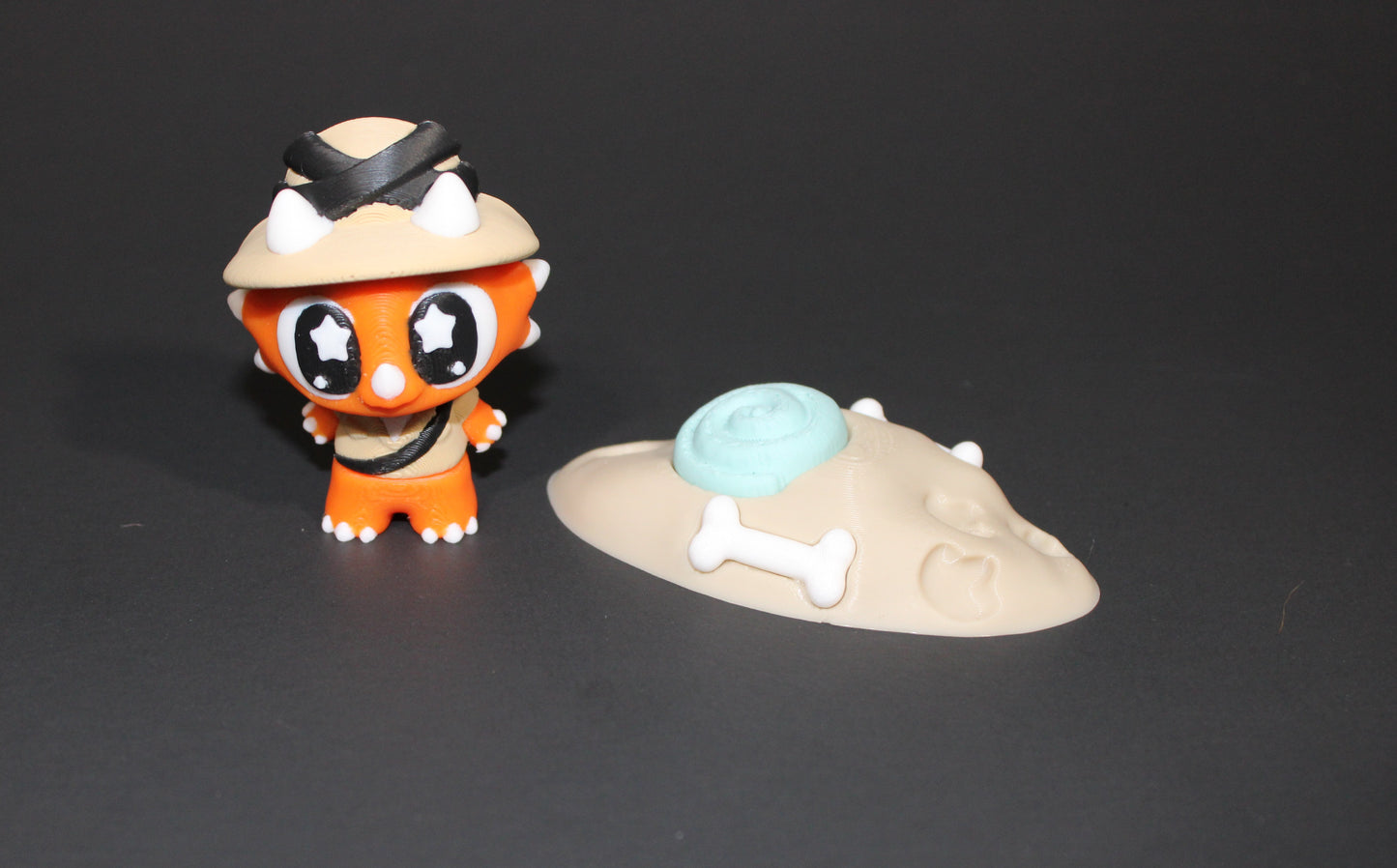 3D Printed Flexi Triceratops Archeologist with fossil