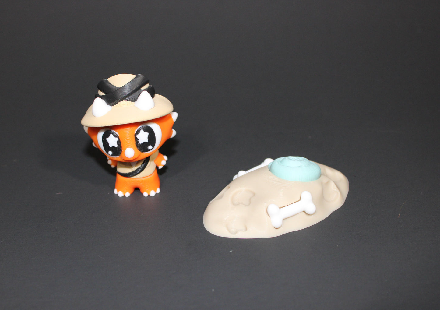 3D Printed Flexi Triceratops Archeologist with fossil