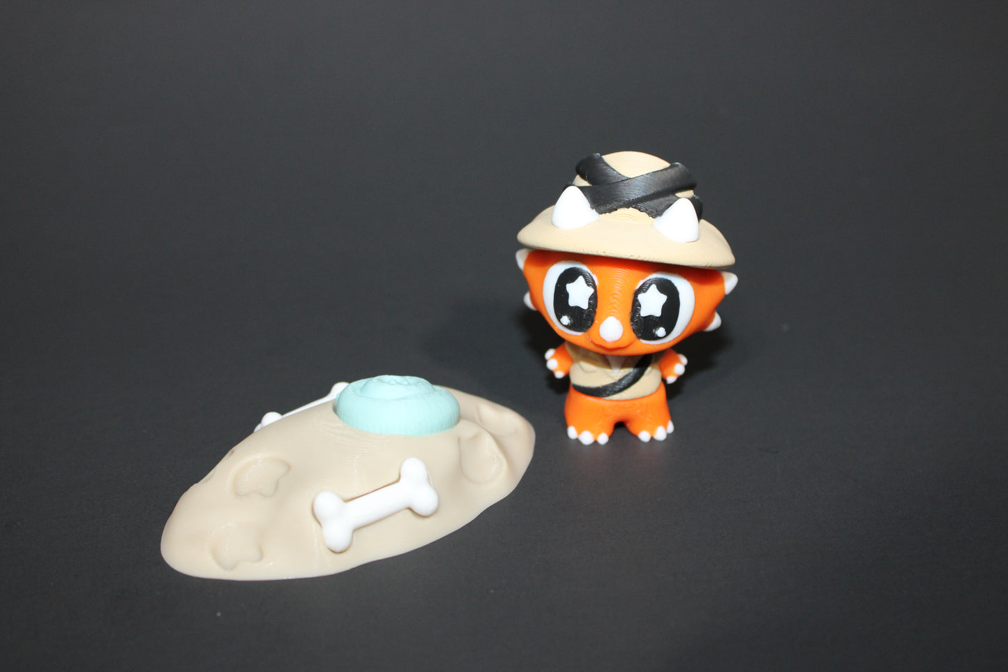 3D Printed Flexi Triceratops Archeologist with fossil