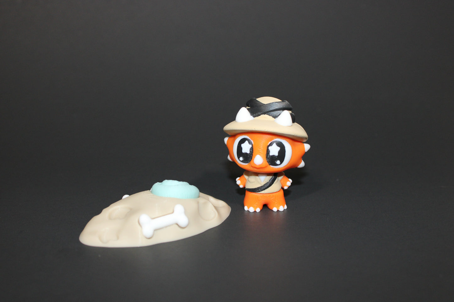 3D Printed Flexi Triceratops Archeologist with fossil