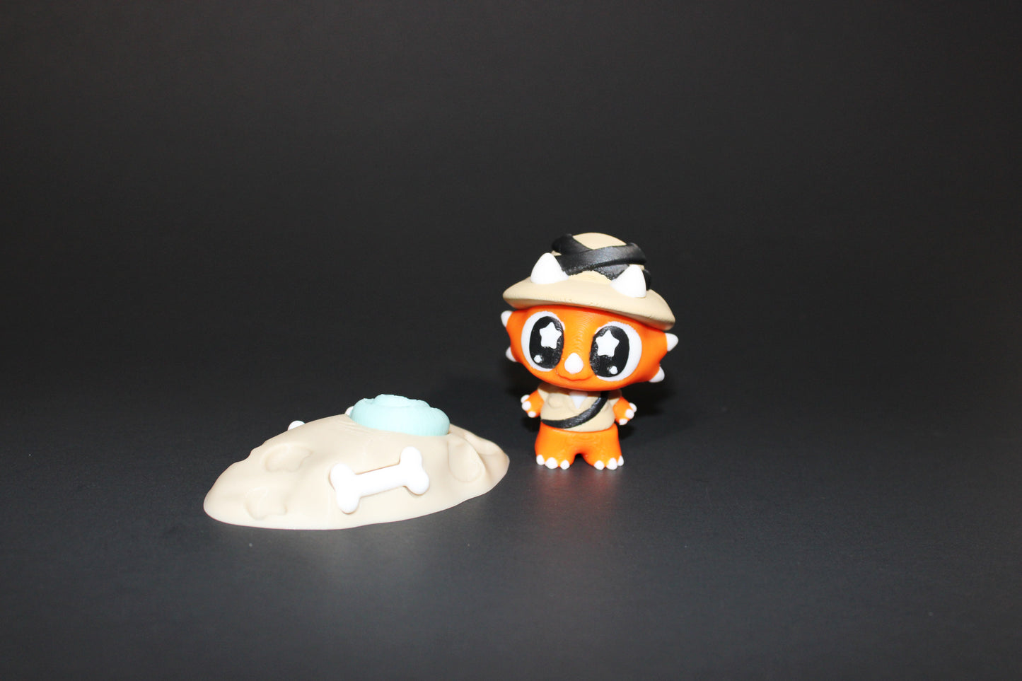 3D Printed Flexi Triceratops Archeologist with fossil