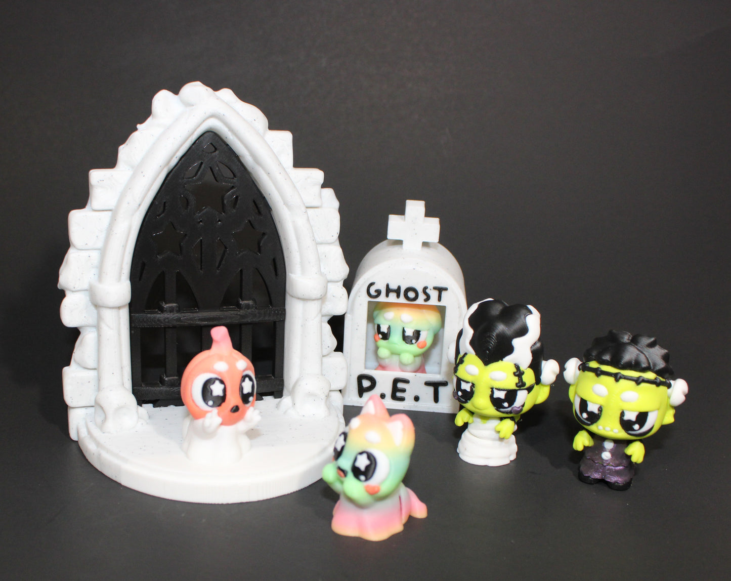 3D Printed Flexi Gothic Crypt Showcase-Includes Frankenstein and Bride, along with a ghost pet tombstone and two ghost pets.
