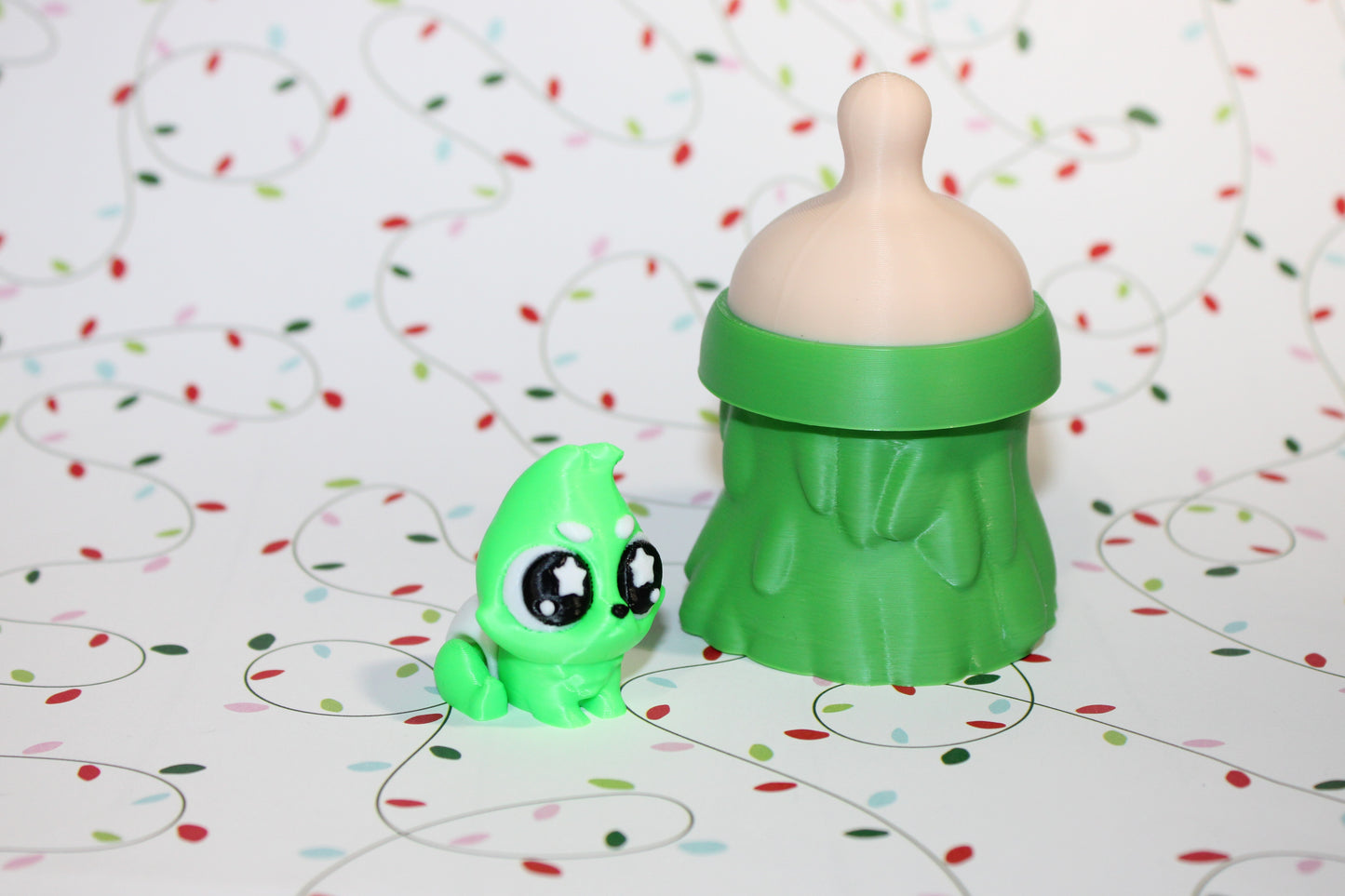 3D-printed Christmas Grumpy baby with Baby Bottle Container