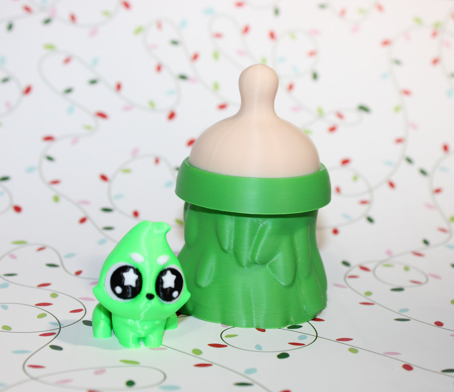 3D-printed Christmas Grumpy baby with Baby Bottle Container