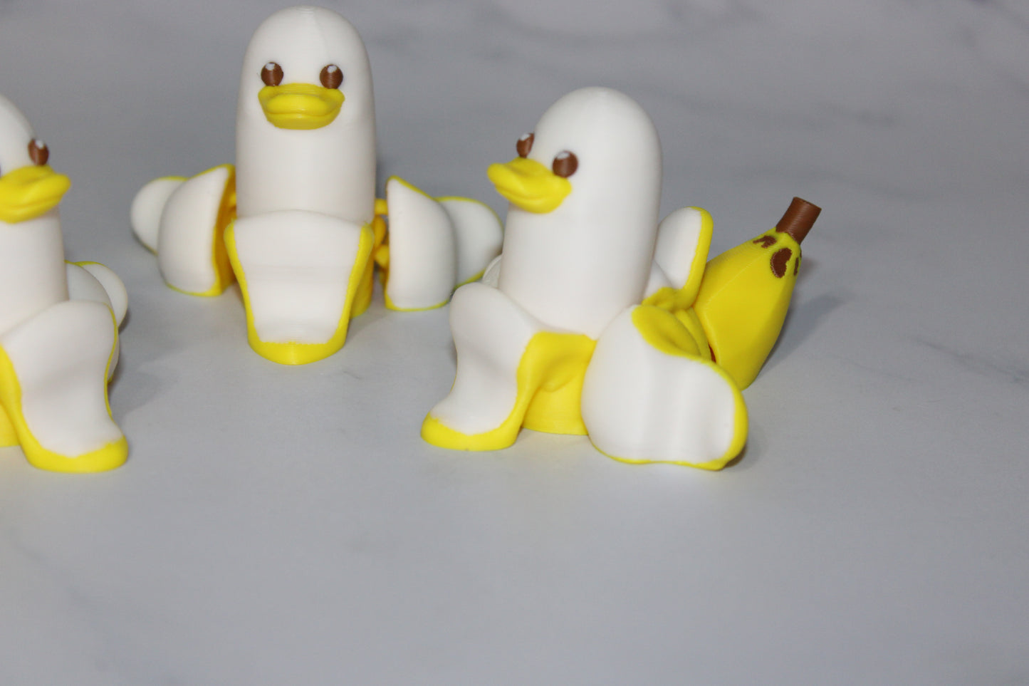 Banana Duck or Lucky Ducky 3D Printed Articulated Figurine 2.25 inches Tall - Wonderland 3D Printing