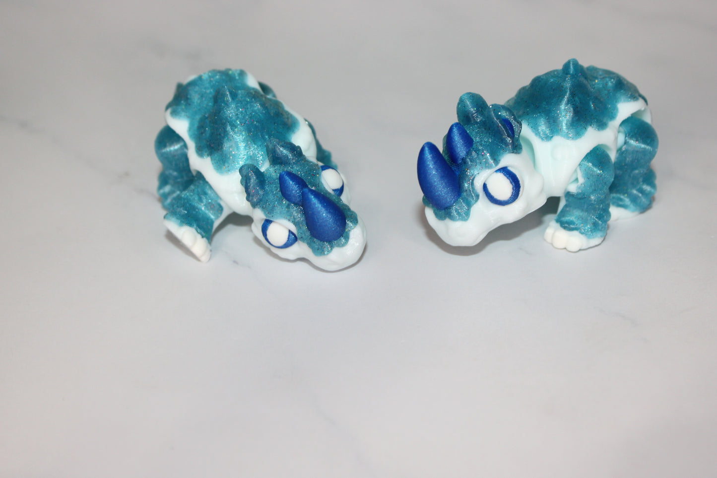 Ice Cream Rhino or Woolly Rhino 3d printed articulated Flexi Fidget Toy - Wonderland 3D Printing