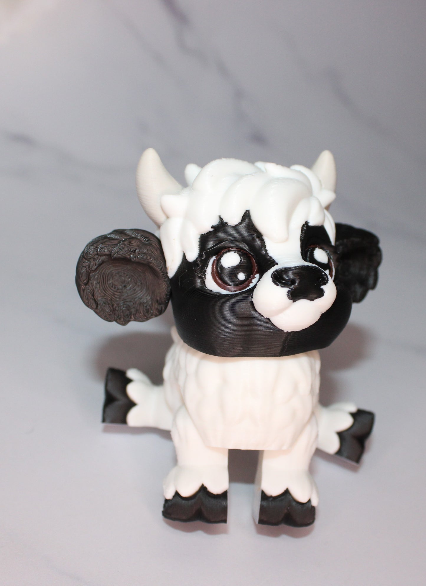 Baby Highland Cow: 3D Printed Articulated Figurine - Wonderland 3D Printing