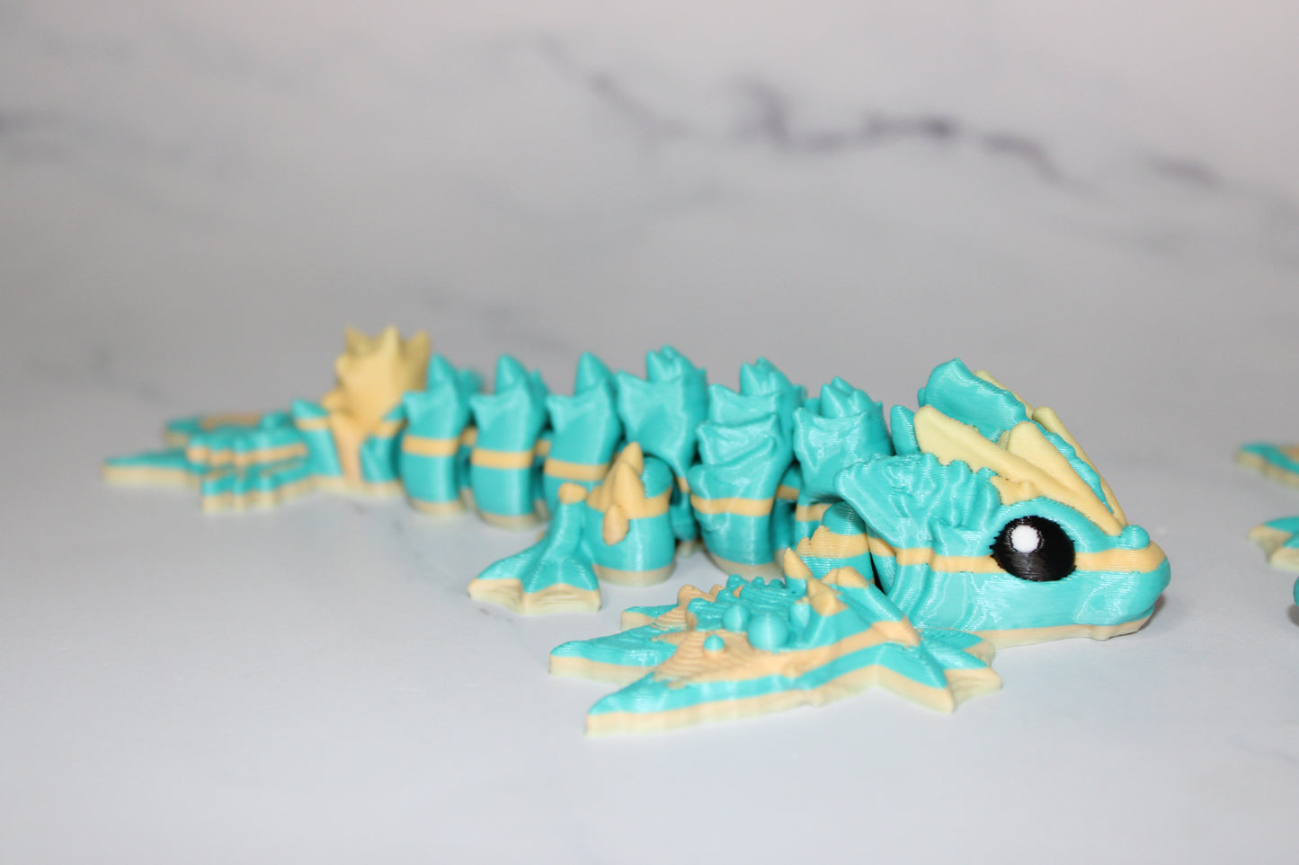 Tiny Ocean Baby Dragon5.5 inches Long 3D Printed Articulated Flexi Figurine - Wonderland 3D Printing