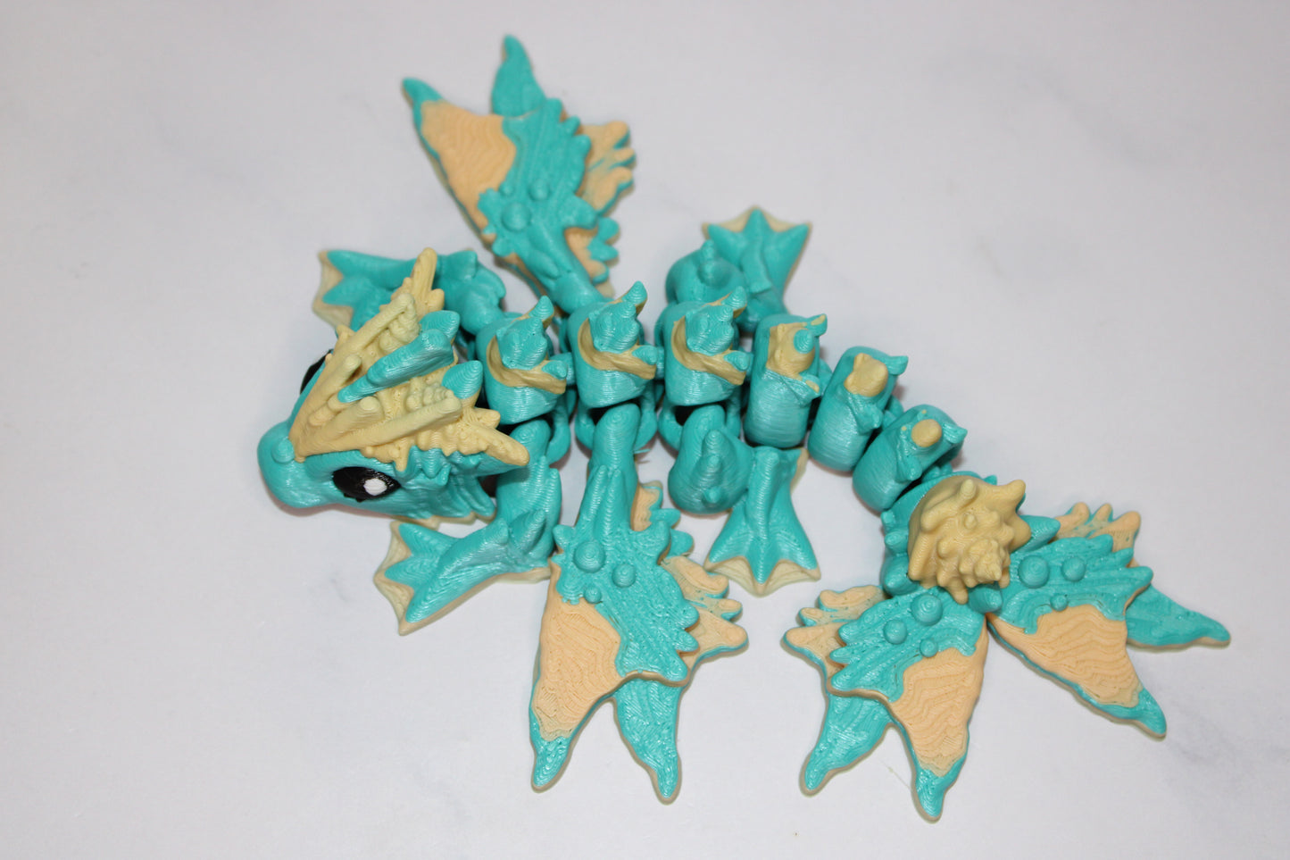 Tiny Ocean Baby Dragon5.5 inches Long 3D Printed Articulated Flexi Figurine - Wonderland 3D Printing