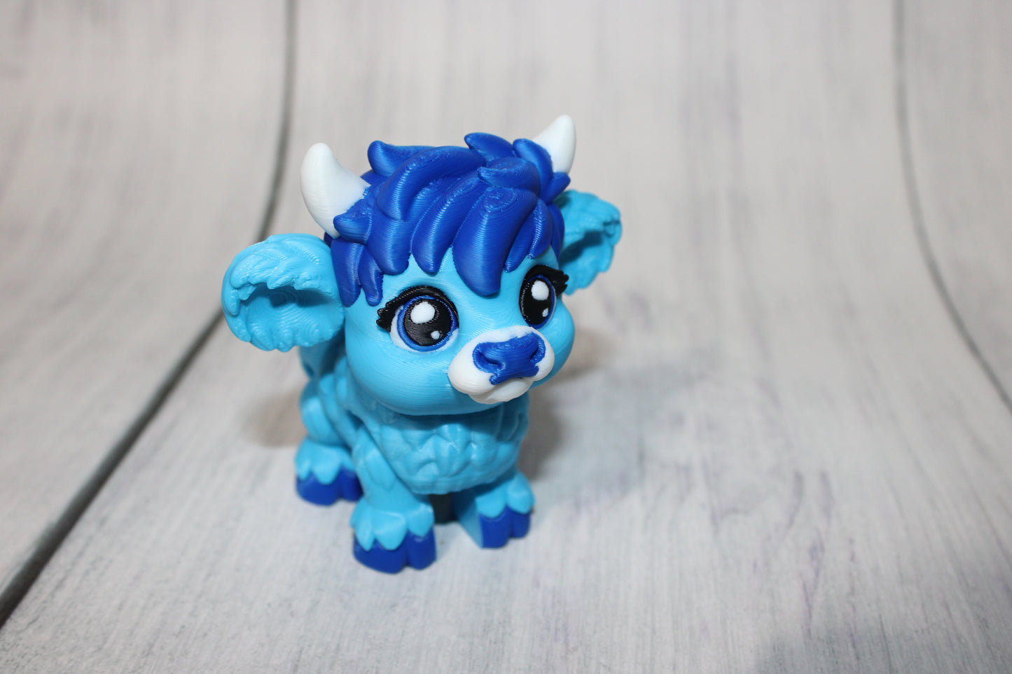 Baby Highland Cow of a Different Color: 3D Printed Articulated Figurine - Wonderland 3D Printing