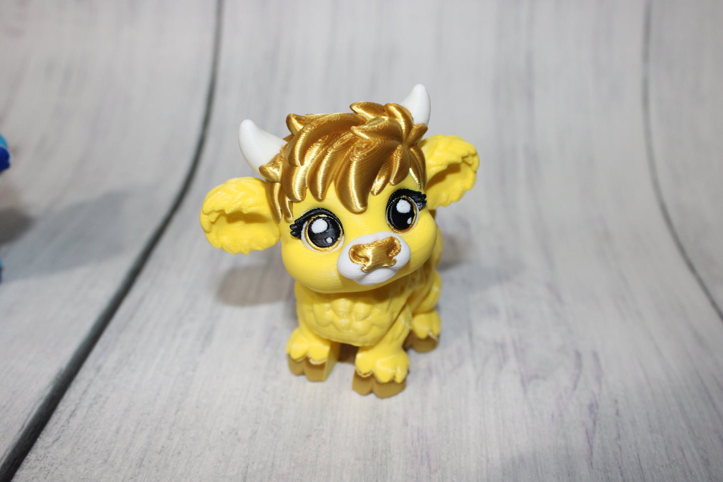 Baby Highland Cow of a Different Color: 3D Printed Articulated Figurine - Wonderland 3D Printing