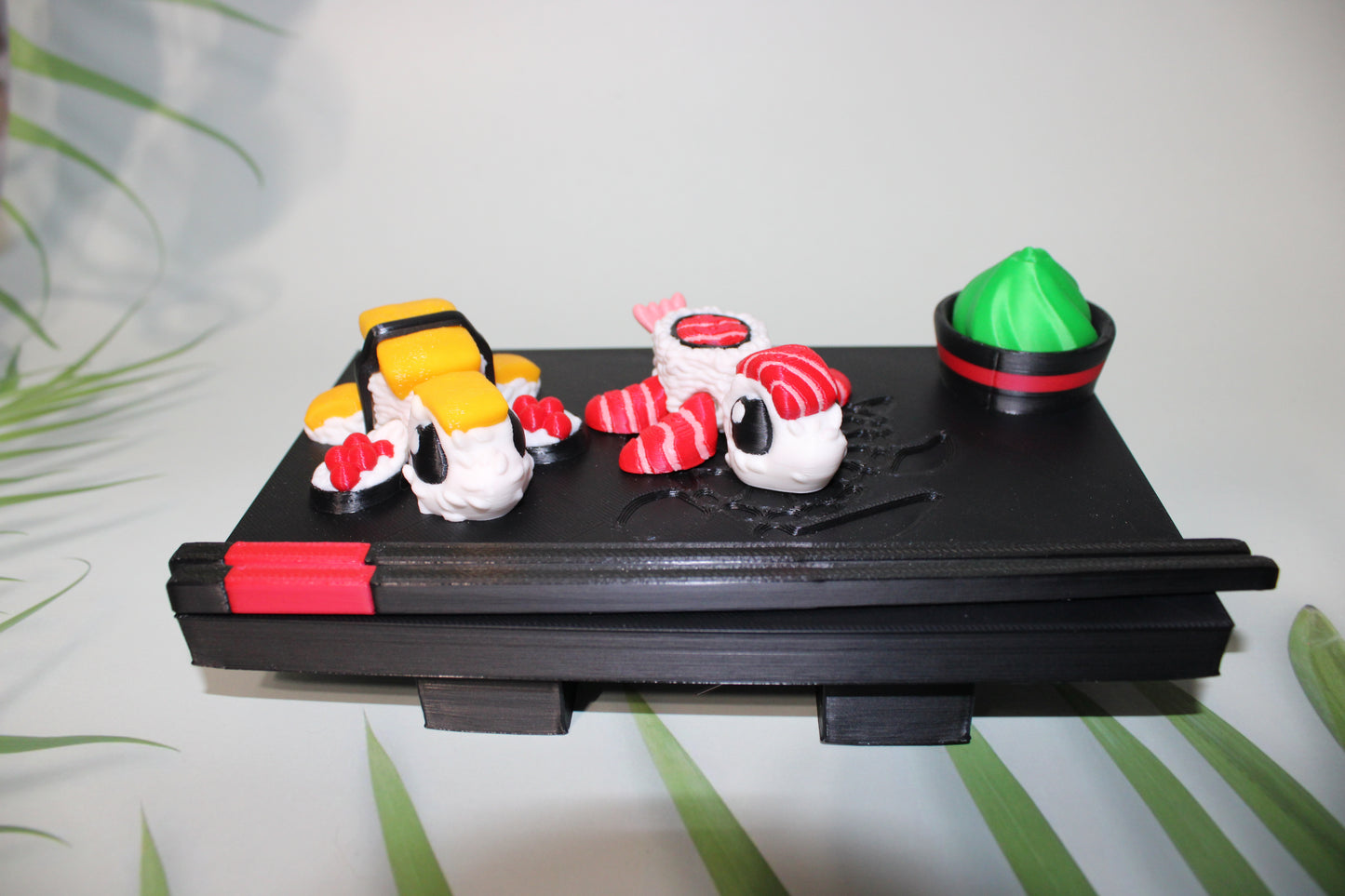 Sushi Turtles - Includes a tray, chopsticks, wasabi with bowl, one Tamago sushi turtle, and one Toro sushi turtle - 3D printed. - Wonderland 3D Printing