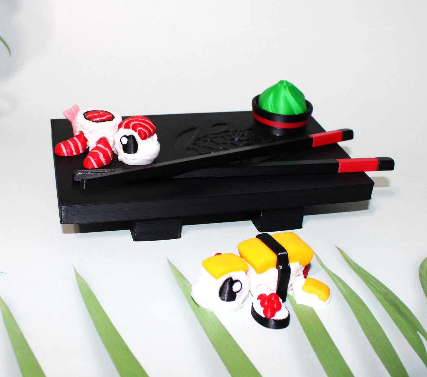 Sushi Turtles - Includes a tray, chopsticks, wasabi with bowl, one Tamago sushi turtle, and one Toro sushi turtle - 3D printed. - Wonderland 3D Printing