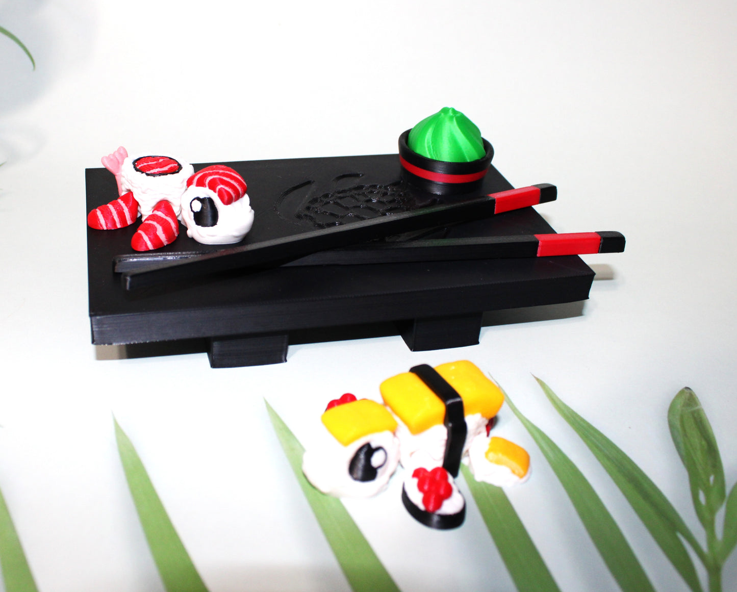 Sushi Turtles - Includes a tray, chopsticks, wasabi with bowl, one Tamago sushi turtle, and one Toro sushi turtle - 3D printed. - Wonderland 3D Printing