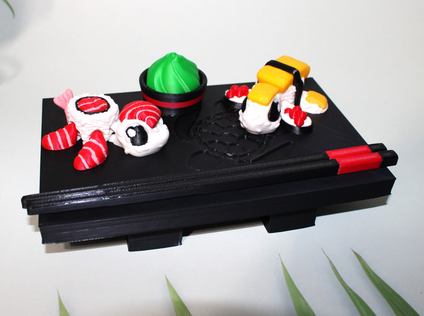 Sushi Turtles - Includes a tray, chopsticks, wasabi with bowl, one Tamago sushi turtle, and one Toro sushi turtle - 3D printed. - Wonderland 3D Printing