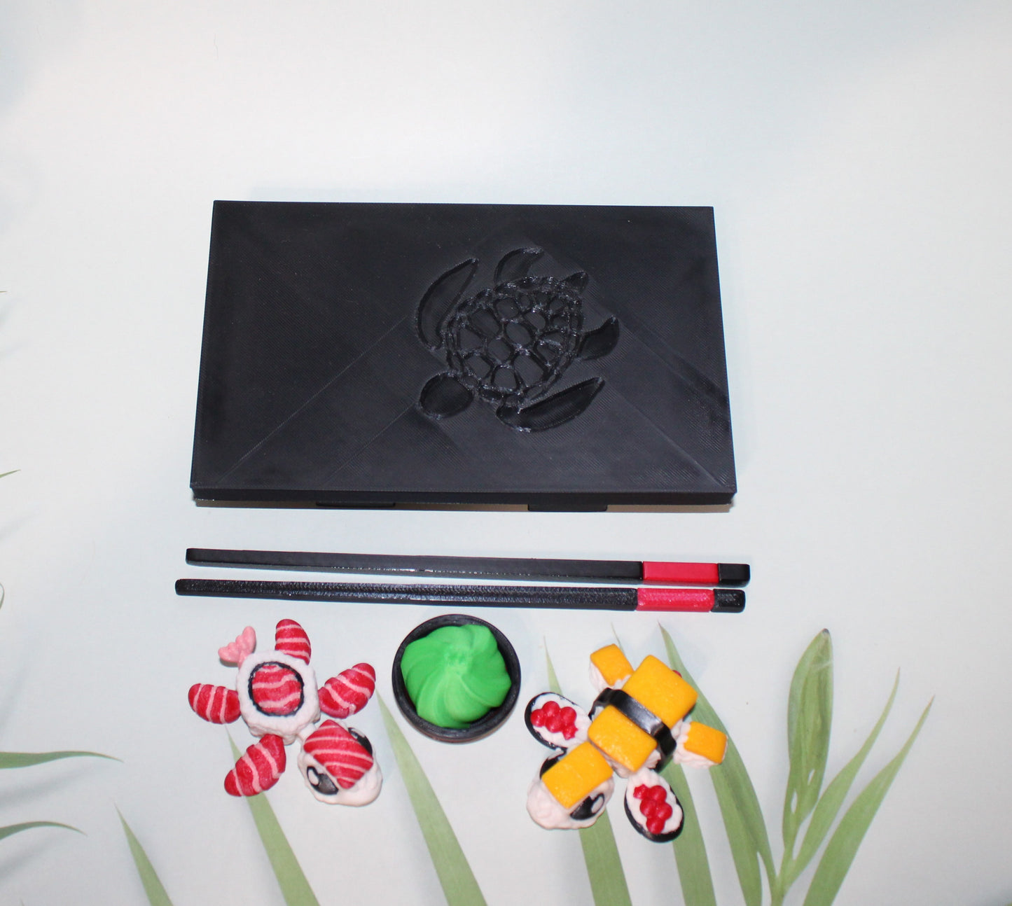 Sushi Turtles - Includes a tray, chopsticks, wasabi with bowl, one Tamago sushi turtle, and one Toro sushi turtle - 3D printed. - Wonderland 3D Printing