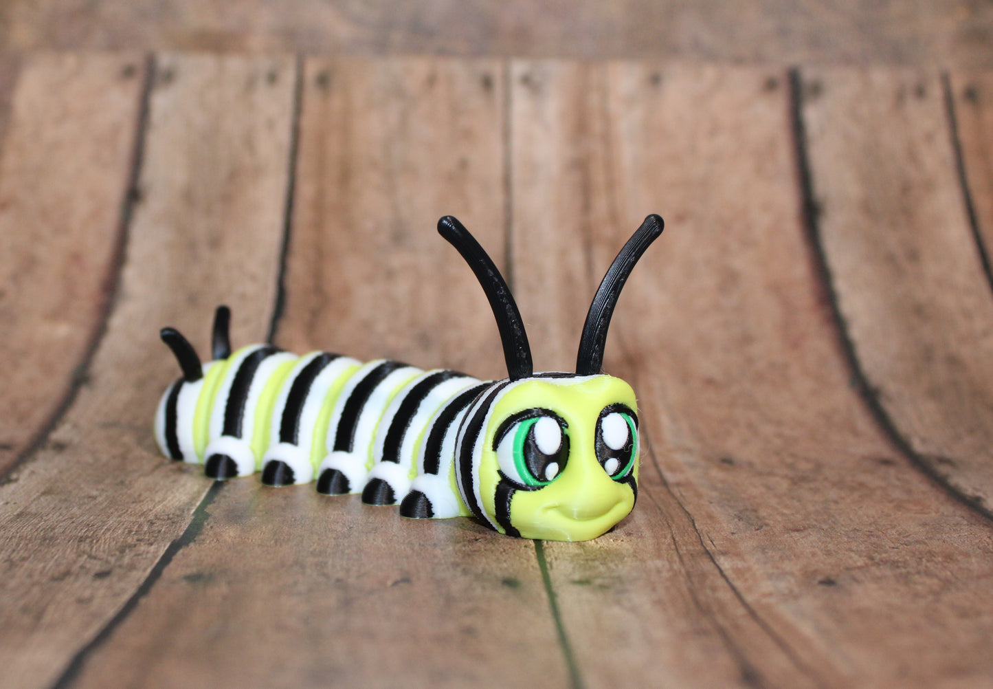 Monarch Caterpillar-4.25 inches Long- 3D Printed Articulated Flexi Fidget Figurine - Wonderland 3D Printing