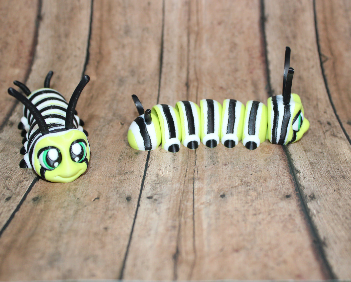 Monarch Caterpillar-4.25 inches Long- 3D Printed Articulated Flexi Fidget Figurine - Wonderland 3D Printing