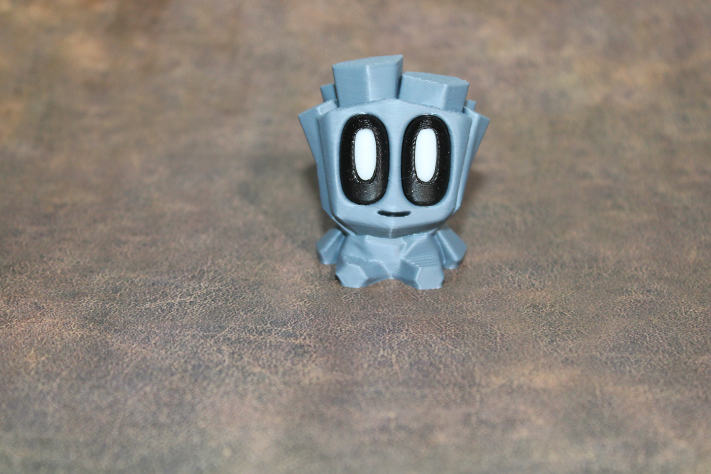 Prehistoric Rock Blob With Carton 3D Printed Articulated Figurines - Wonderland 3D Printing