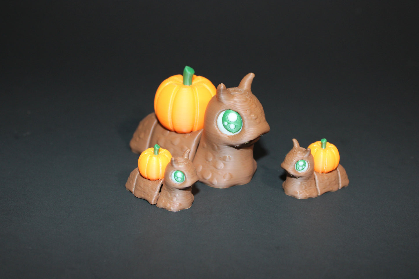 Spooky Snails all 3 included- 3D Printed Fidget Toy. 1 Pumpkin, 1 Cauldron, and 1 Skull - Wonderland 3D Printing
