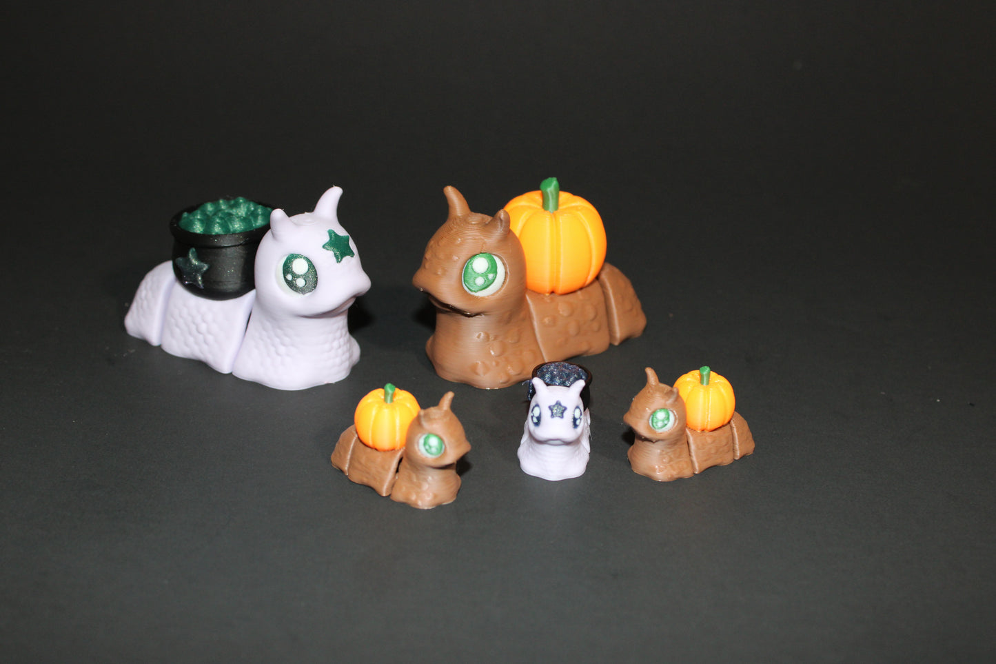Spooky Snails all 3 included- 3D Printed Fidget Toy. 1 Pumpkin, 1 Cauldron, and 1 Skull - Wonderland 3D Printing