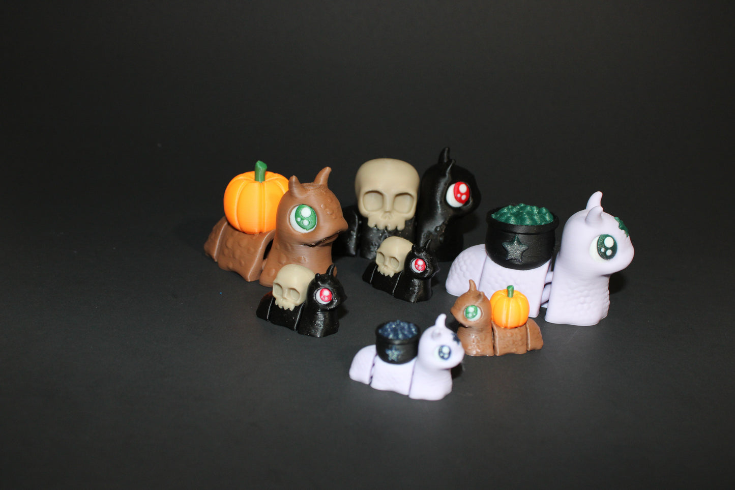 Spooky Snails all 3 included- 3D Printed Fidget Toy. 1 Pumpkin, 1 Cauldron, and 1 Skull - Wonderland 3D Printing