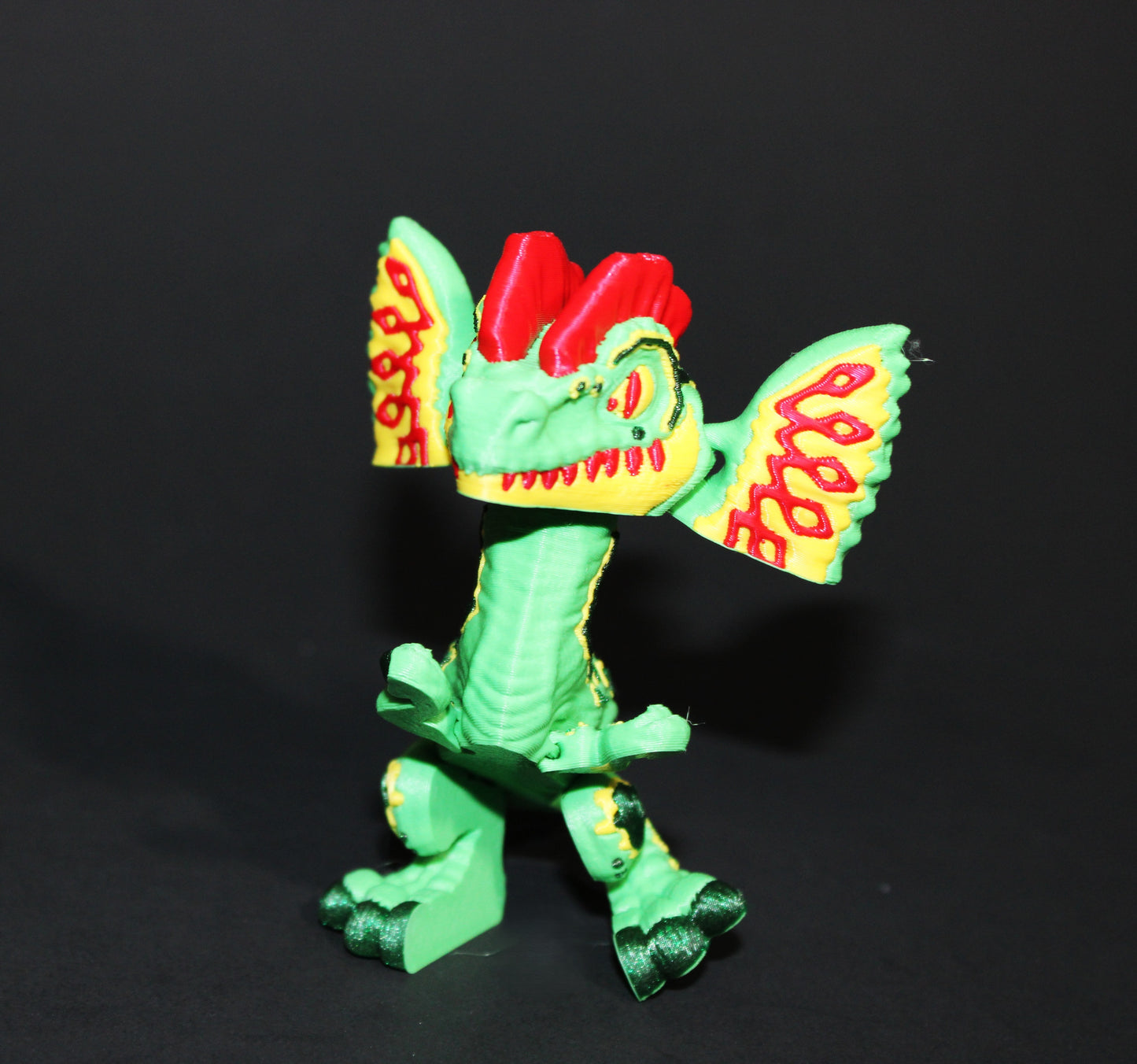 Mini 3D Printed Flexi Dilophosaurus Articulated 3.25 inches Tall - Wonderland 3D Printing