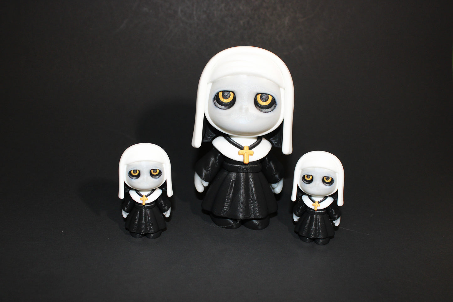 Nun 3d printed Articulated Figurines-Face Glows in the Dark - Wonderland 3D Printing