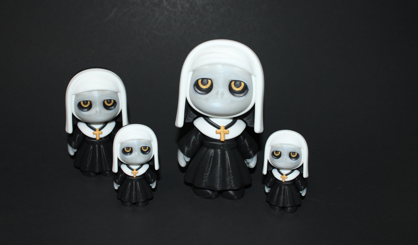Nun 3d printed Articulated Figurines-Face Glows in the Dark - Wonderland 3D Printing