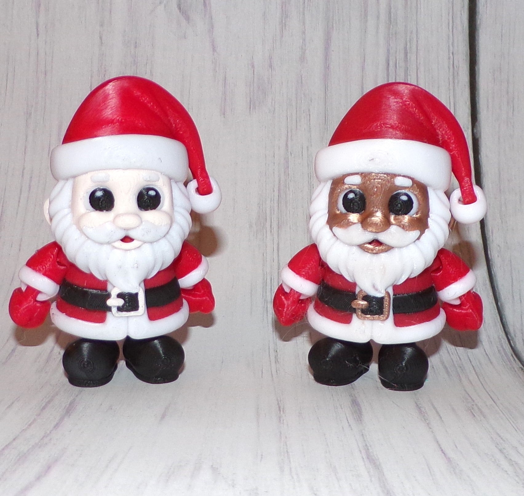 Mrs. Clause, Young Mrs. Clause and Santa 3D Printed Articulated Figurine - Wonderland 3D Printing 